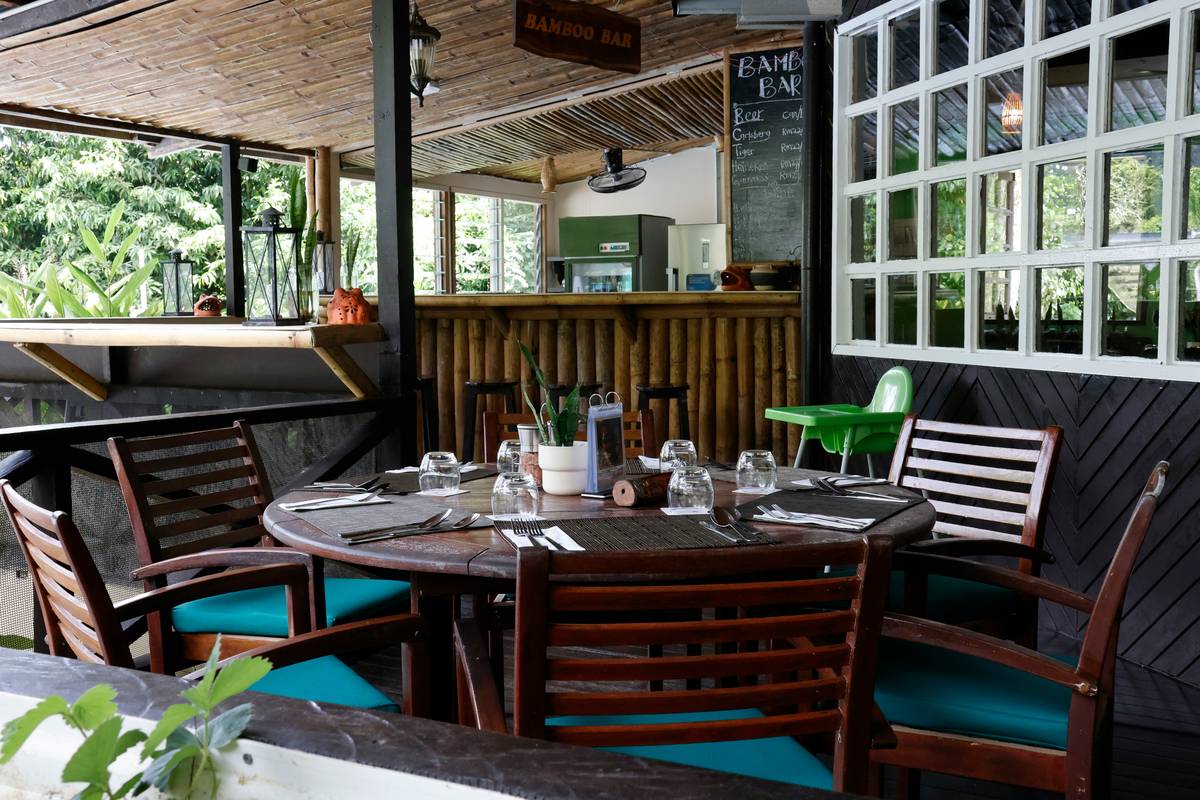 what is garden furniture - comparison of parasol bases showing lightweight vs weighted stability